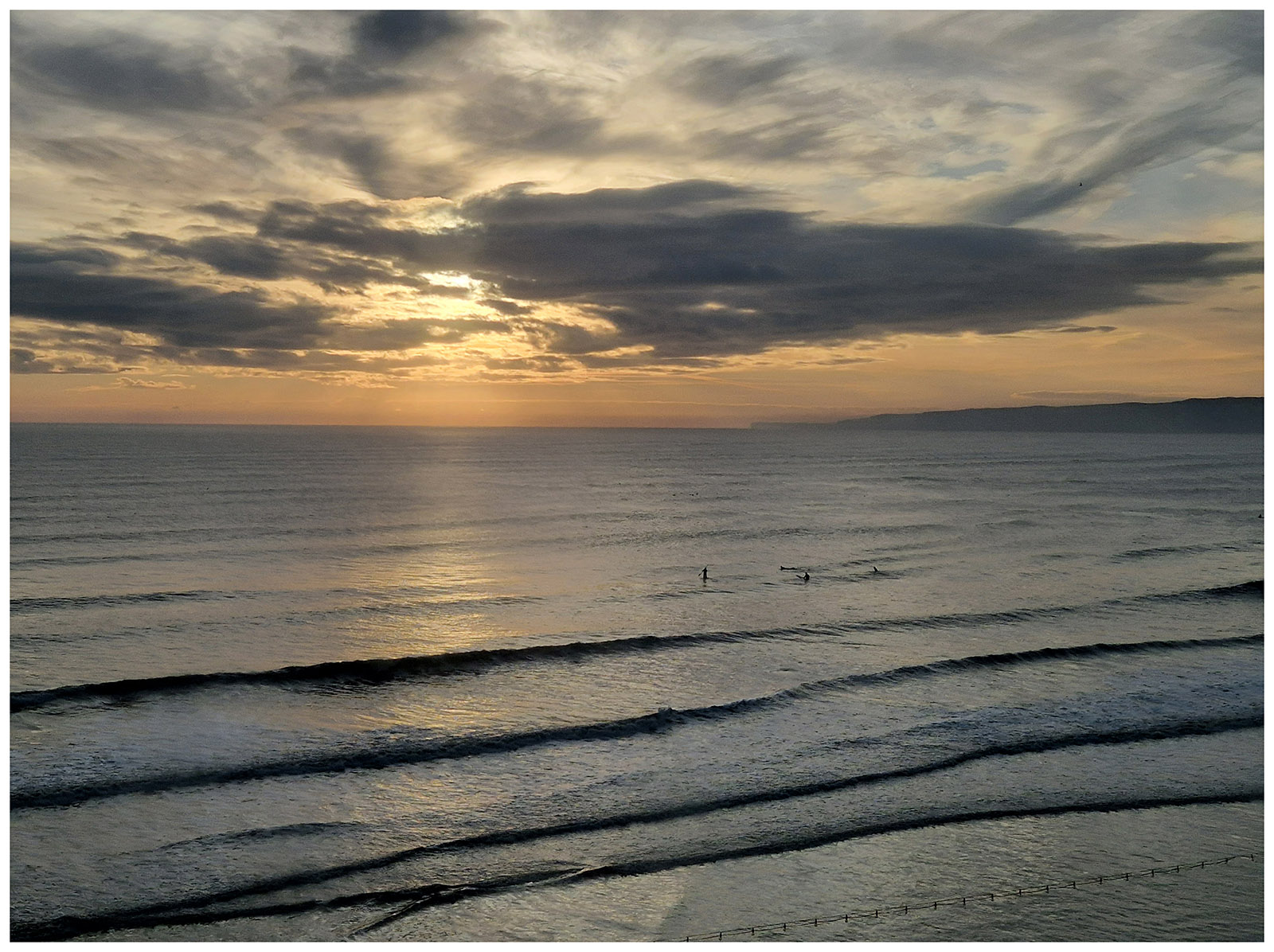Surfers at sunset, Sue Hoggett
